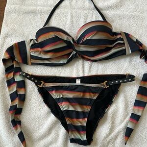 Sexy bikini by PILQ multi color with hardware along sides w/ leather & gold